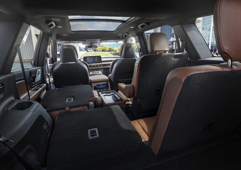 One side of the PowerFold® third-row seat and a second-row seat are folded forward in the 2026 Lincoln Aviator® SUV. | Lincoln of Troy in Troy MI