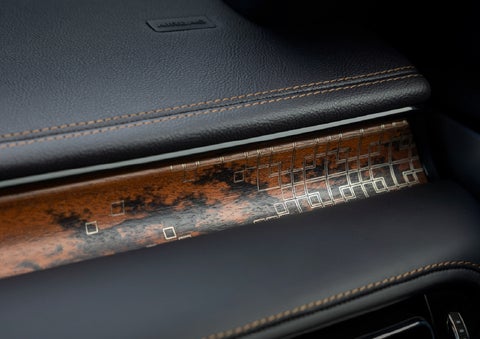 A close-up shot of the 2026 Lincoln Aviator® dashboard with unique black and brown accents and brown stitching | Lincoln of Troy in Troy MI