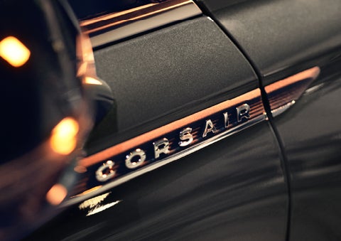 The stylish chrome badge reading “CORSAIR” is shown on the exterior of the vehicle. | Lincoln of Troy in Troy MI