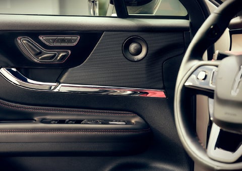 An audio speaker is shown in the driver's side door of a 2026 Lincoln Corsair® SUV | Lincoln of Troy in Troy MI