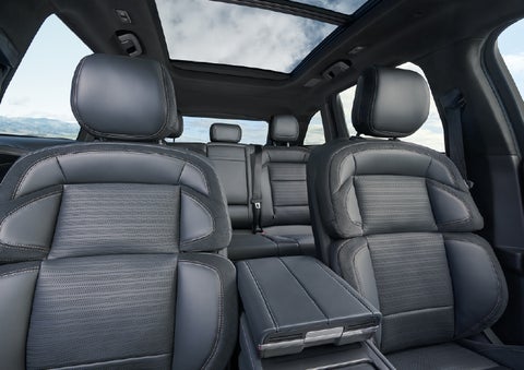 The spacious second row and available panoramic Vista Roof® is shown. | Lincoln of Troy in Troy MI