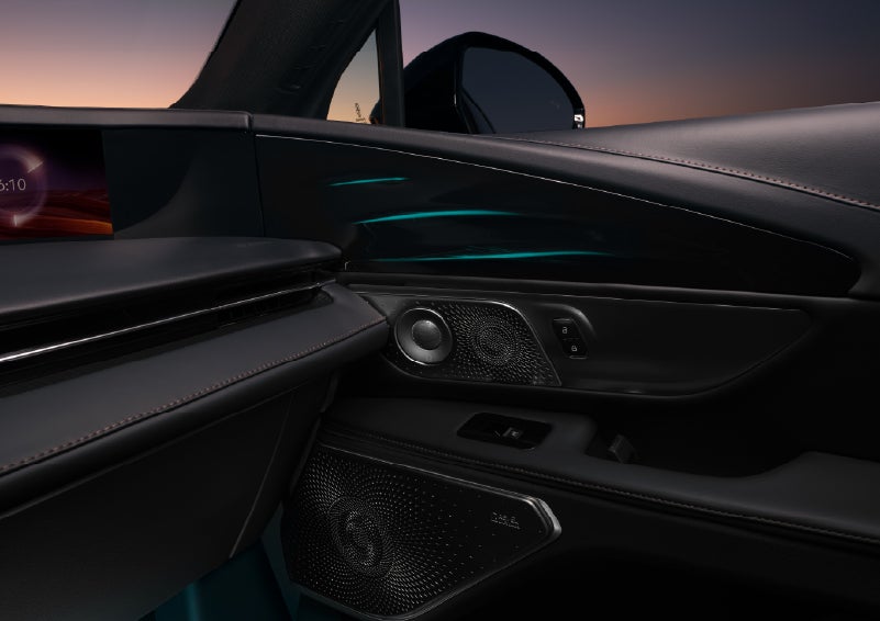 Selectable ambient lighting glows in the passenger door panel. | Lincoln of Troy in Troy MI