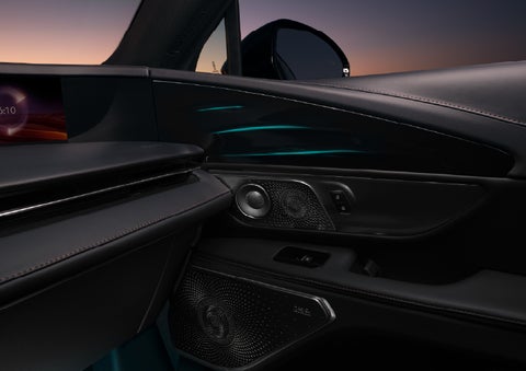 Selectable ambient lighting glows in the passenger door panel. | Lincoln of Troy in Troy MI