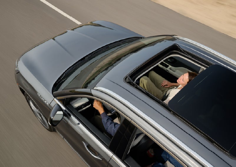 The available panoramic Vista Roof® of a 2027 Lincoln Aviator® SUV is open. | Lincoln of Troy in Troy MI