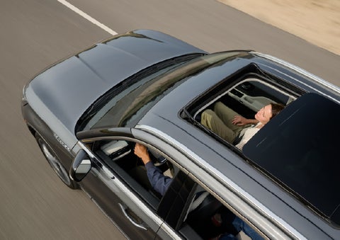 The available panoramic Vista Roof® of a 2027 Lincoln Aviator® SUV is open. | Lincoln of Troy in Troy MI
