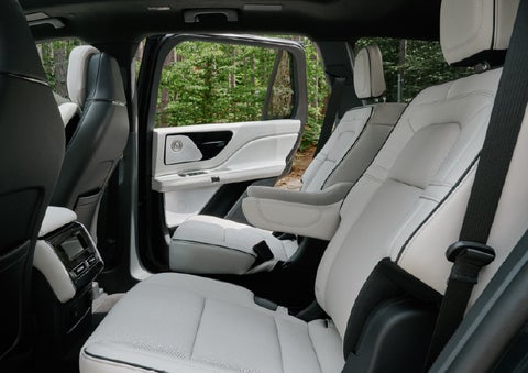 A side view of the second row with captain’s chairs in a 2027 Lincoln Aviator® Black Label™ SUV. | Lincoln of Troy in Troy MI