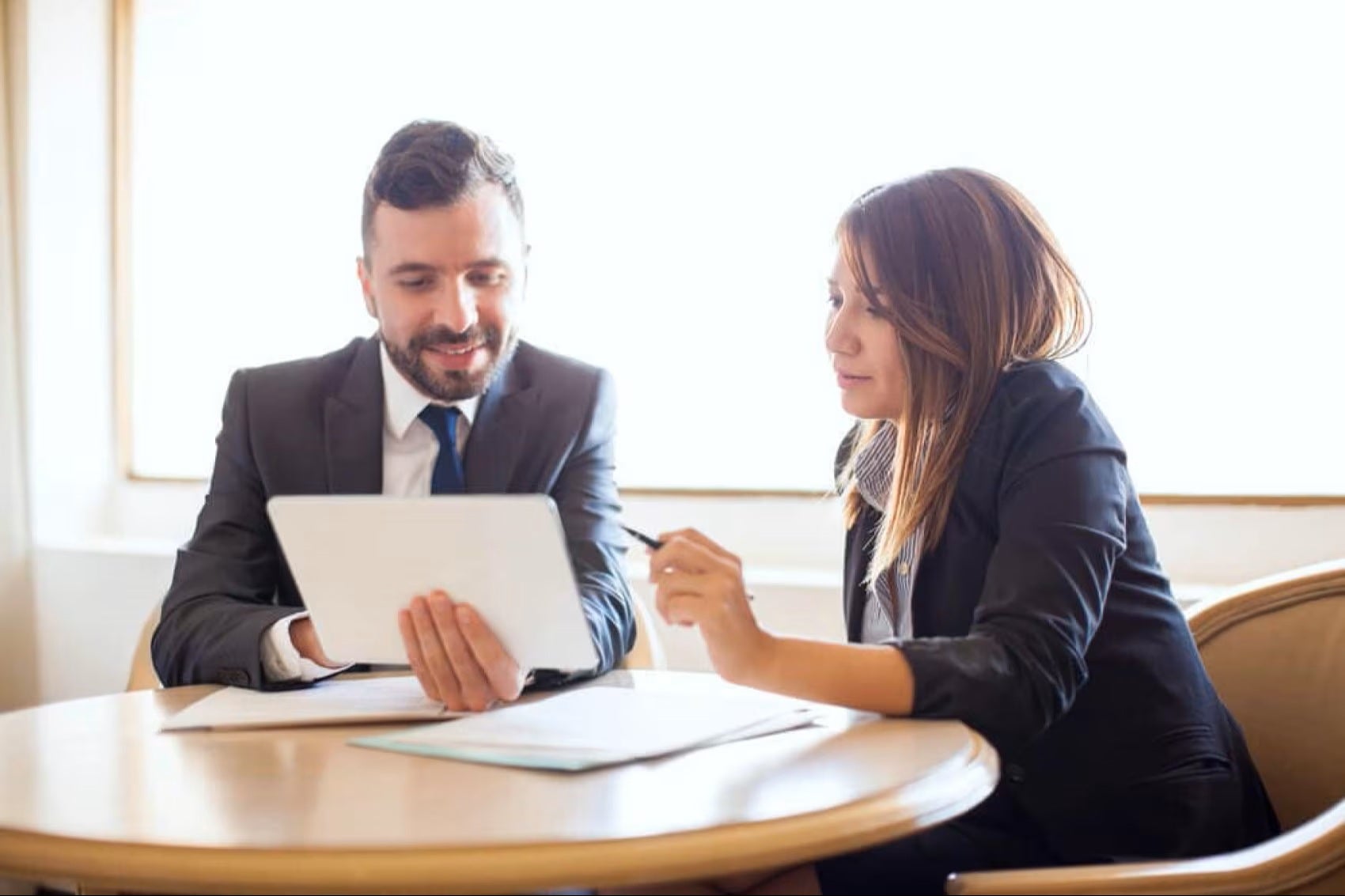 finance team talking about paperwork