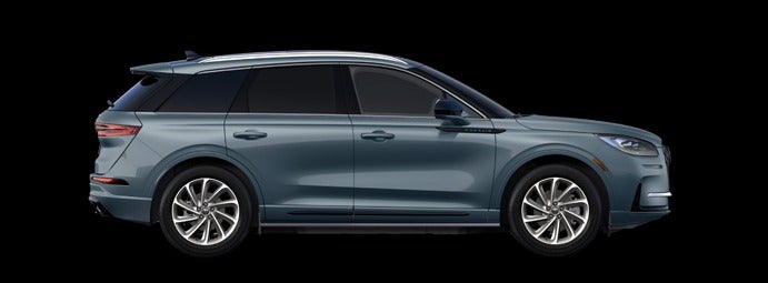 The passenger side of a Lincoln Corsair<sup>®</sup> SUV is shown in the Whisper Blue extra-cost exterior paint option.