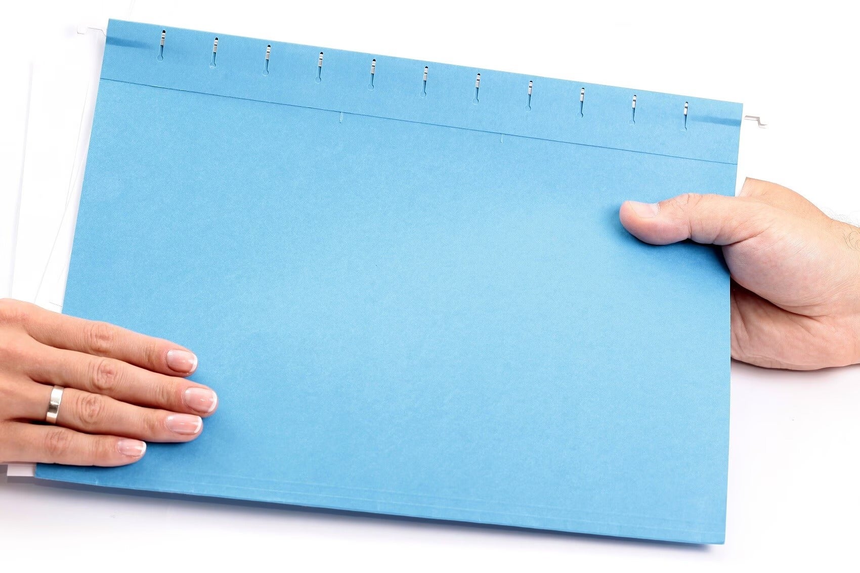 Managers passing paperwork folder
